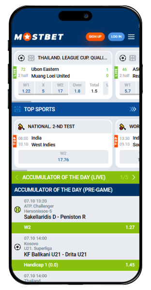 A phone with the sports page Mostbet website open